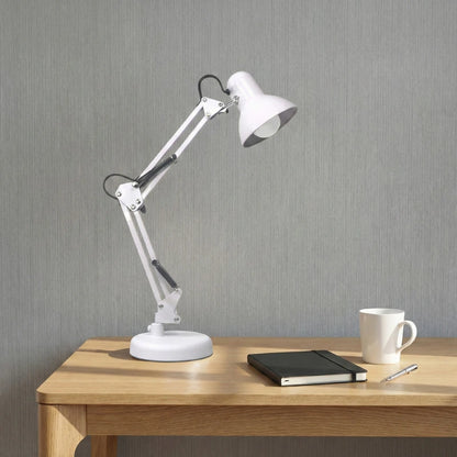 Lampe de Bureau Articulée Blanche placée au-dessus d'un espace de travail en bois clair