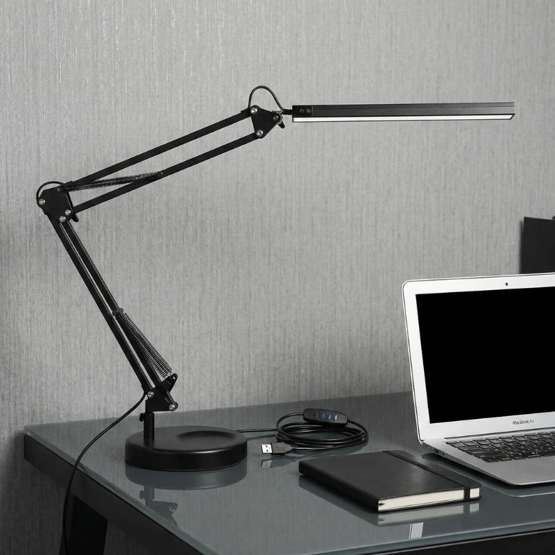 Lampe de Bureau Articulée en Métal sur un bureau en verre