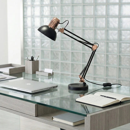Lampe de Bureau Articulée Vintage placée sur un bureau en verre