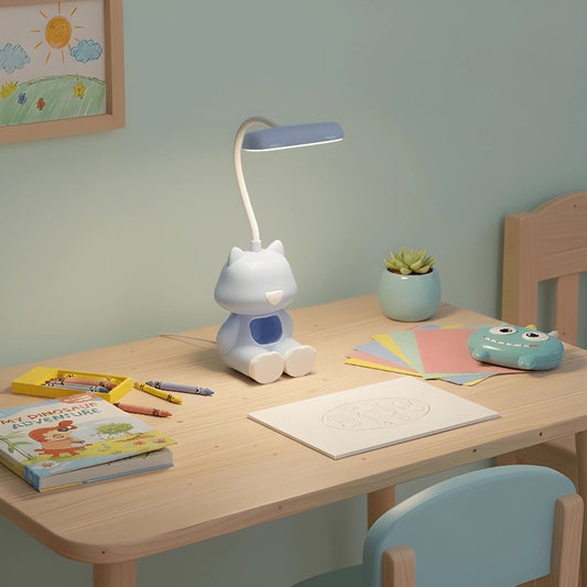 Lampe de Bureau Enfant Chat LED Flexible posée sur un bureau en bois
