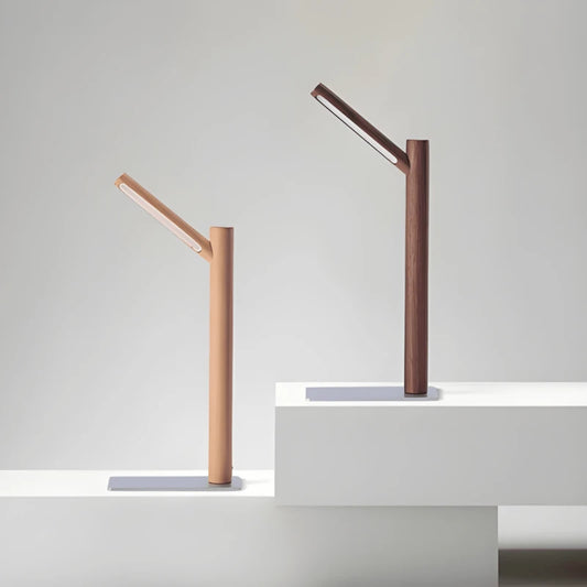 Lampe de bureau LED branche de bois sur deux dalles de pierres
