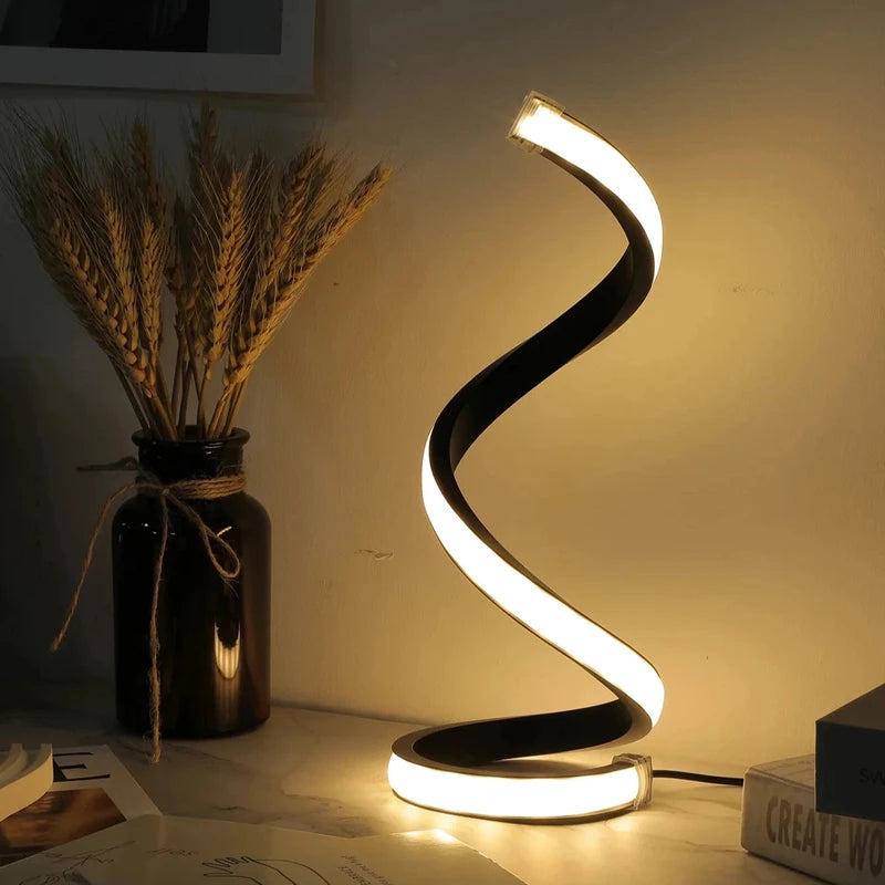 Une lampe de bureau led en forme de spirale teinte chaude
